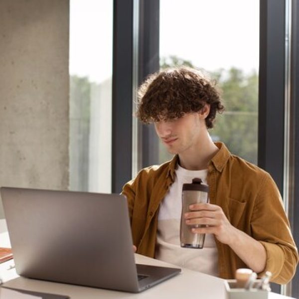 side-view-man-working-laptop_23.jpg